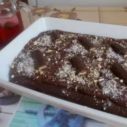 Бисквитена торта с кокос и шоколадови пури