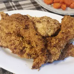 Панирани пилешки гърди със сусам