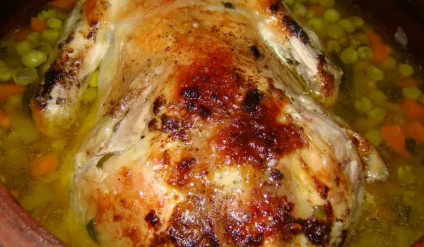 Печена кокошка със зеленчуци в гювеч