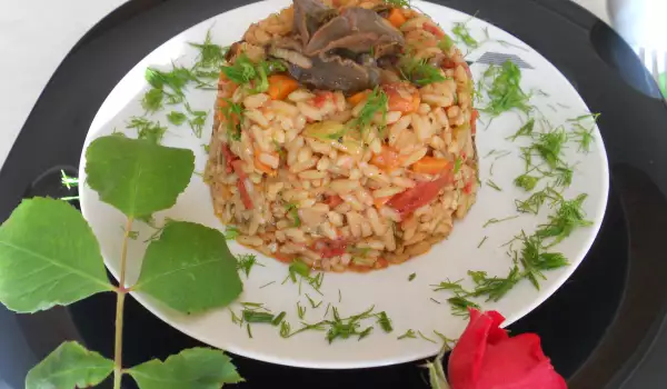 Охлюви с ориз и зеленчуци на фурна