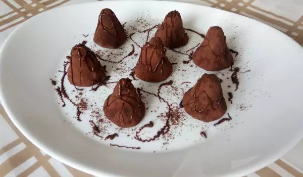Различни шоколадови бонбони с червен боб